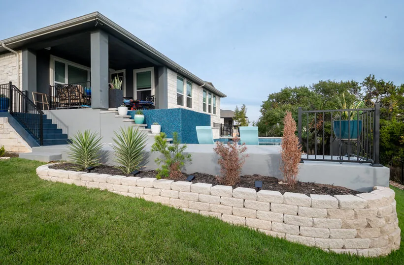 Backyard Pool + Landscaping Renovation by New Edge Renovations in Austin, TX